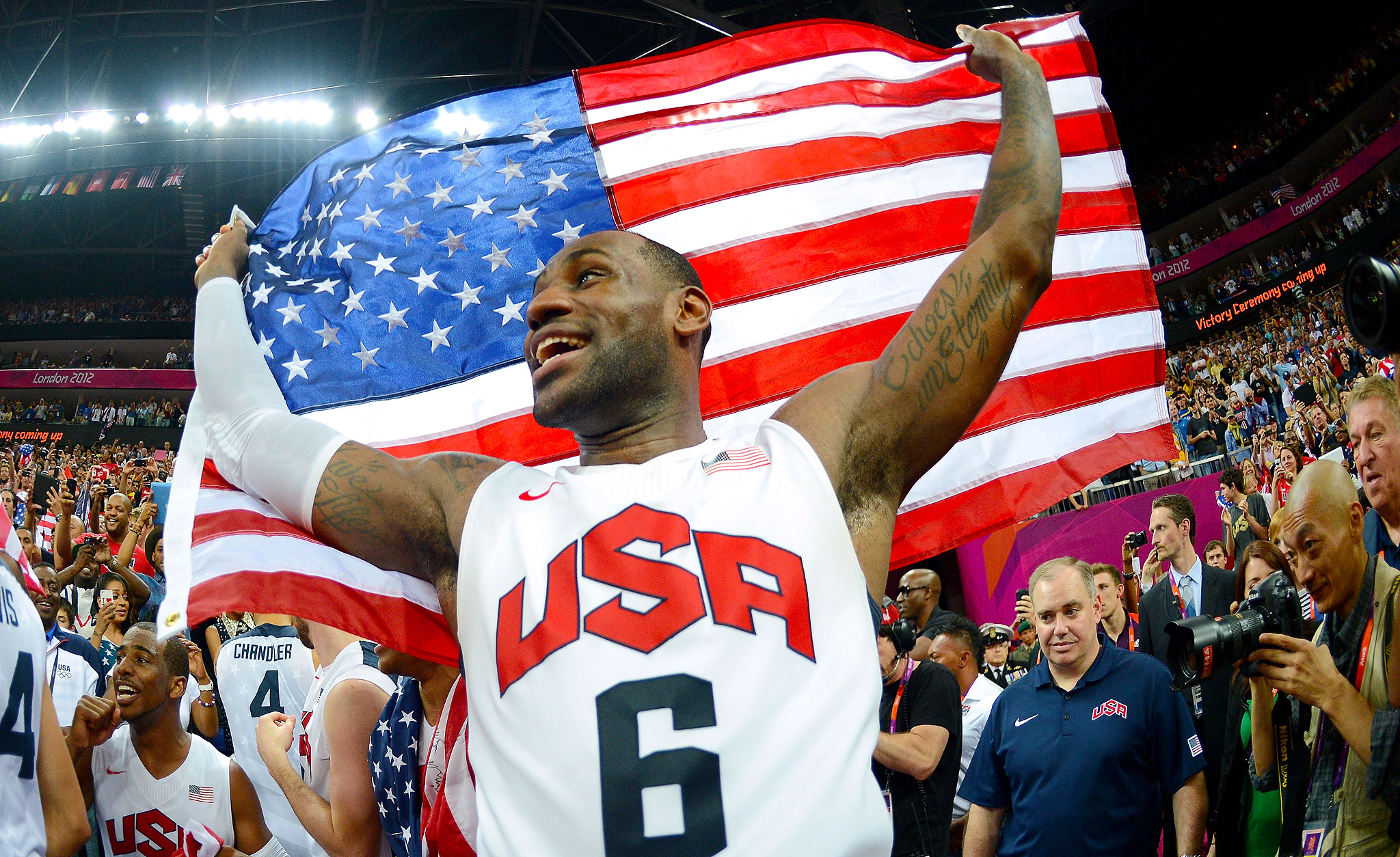 Athlete holding American flag